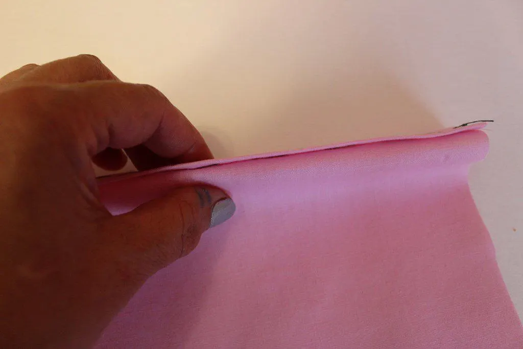 Fold the fabric to start sewing invisible stitch