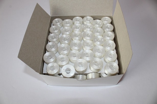 box of pre-wound bobbins