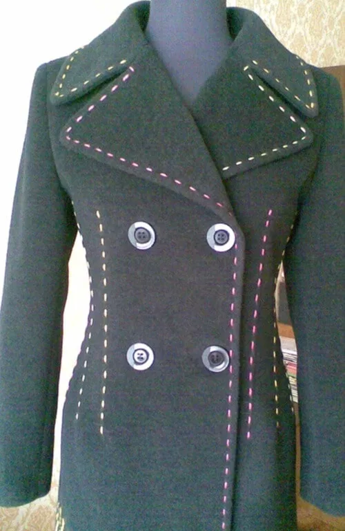 Jacket decorated with a running stitch