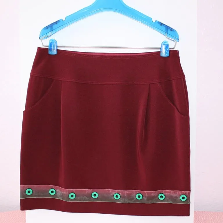 Skirt with button embellishment