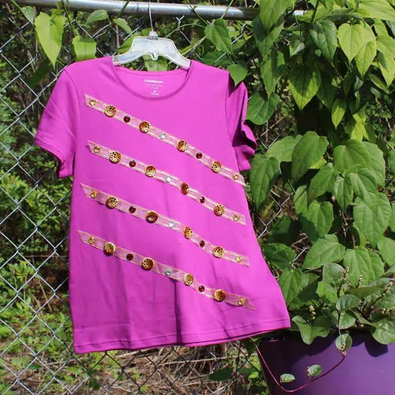 T-shirt with button embellishment