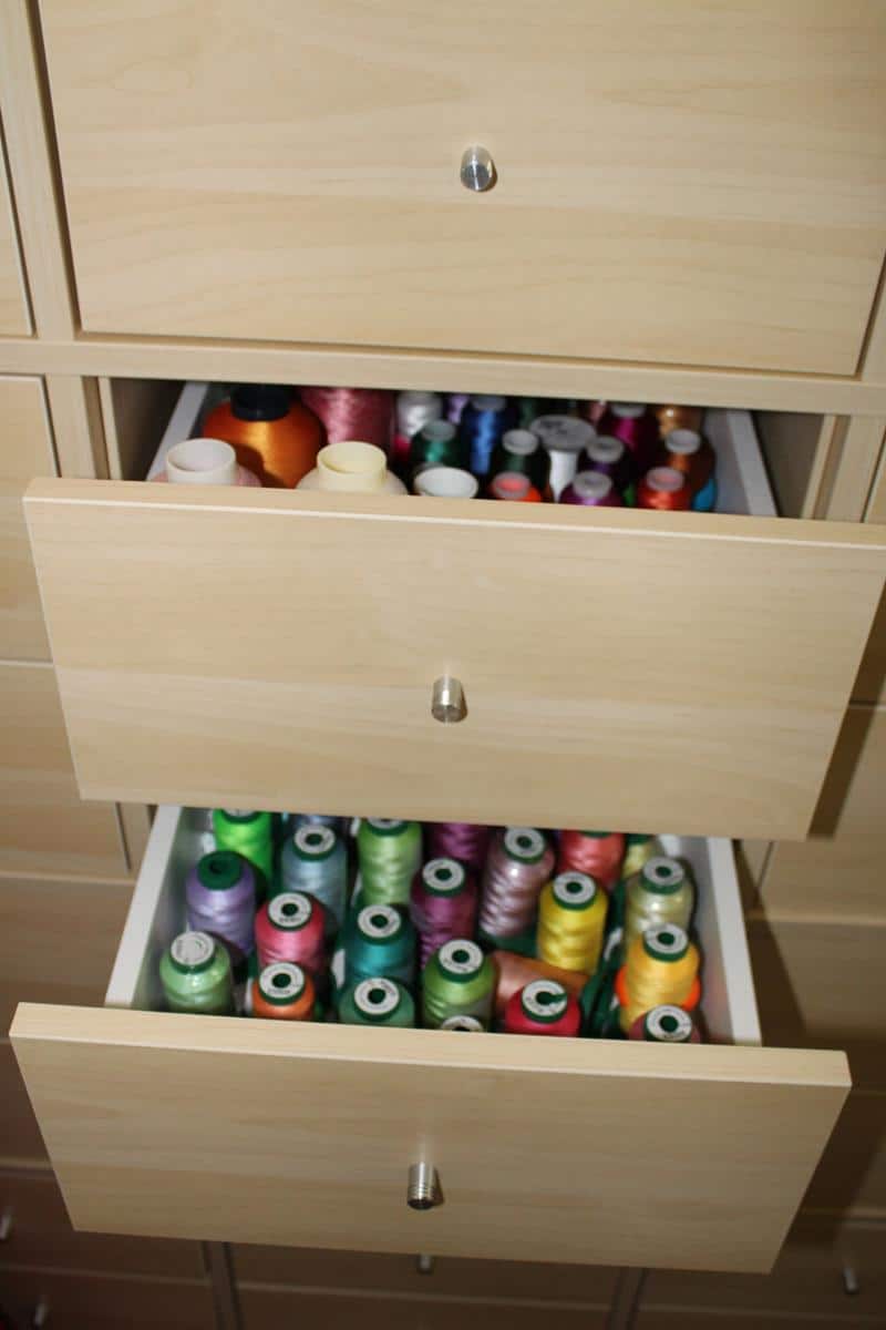 storing threads in a drawer as a way to show good care of sewing tools and equipment