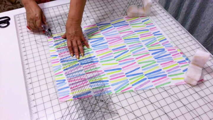 cutting fabric straight using a cutting mat and a rotary cutter