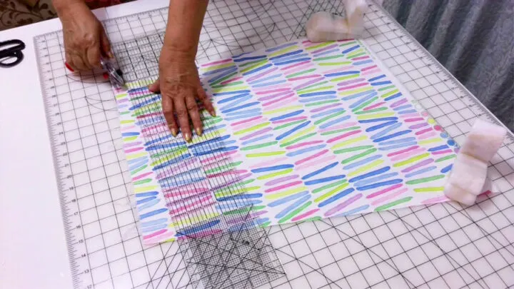 cutting fabric straight using a cutting mat and a rotary cutter