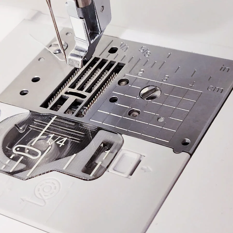 guidelines on a sewing machine throat plate