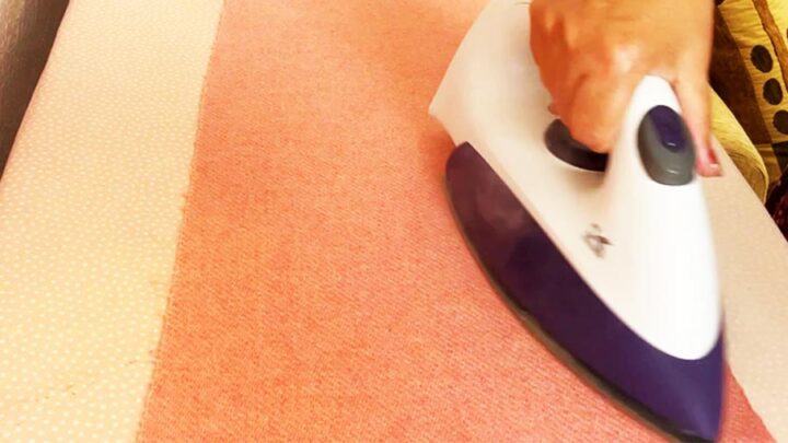 using steam iron to prepare wool flannel for the project 