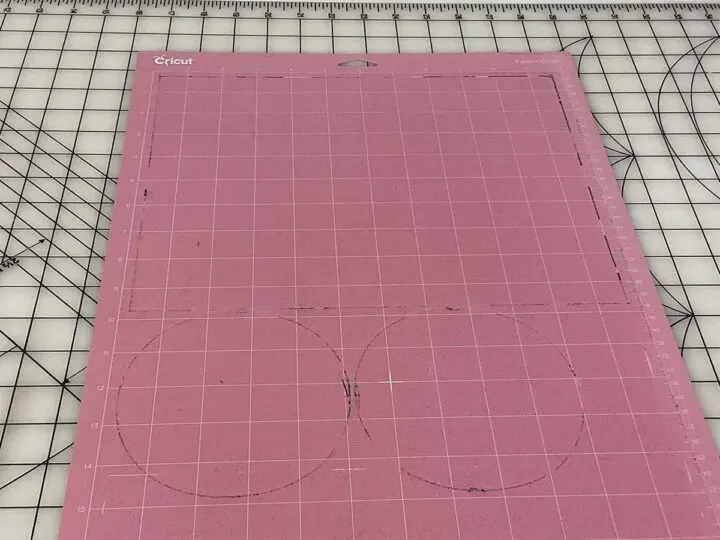 Cricut fabric cutting mat covered with lint