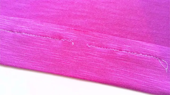 don't use a regular straight stitch to hem knit fabric