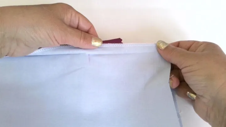 Close your zipper and place the right sides of the fabric together. 