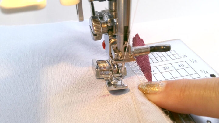 Start sewing from the bottom toward the zipper