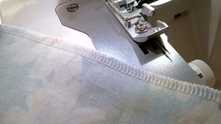 Stitch side seams using 4 thread 2 needle serger stitch
