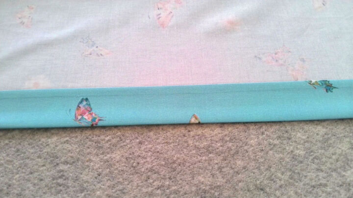 fold the fabric again - this time 1 ⅛ inches and press. Make sure it’s the same width all over.  