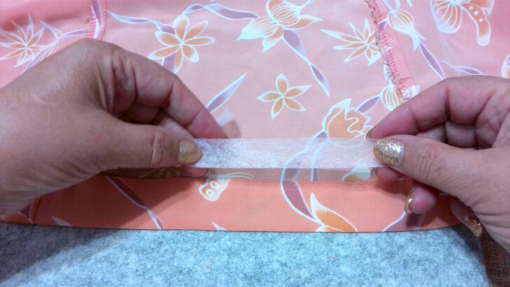 Insert the bonding web into the hem area