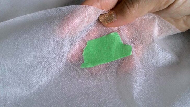 use painter's tape to identify the adhesive side of fusible interfacing