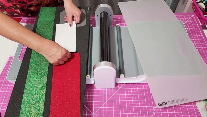 Place fabric rectangles on the die