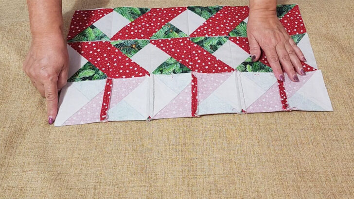 Sew rows of squares perpendicular to the already sewn rows