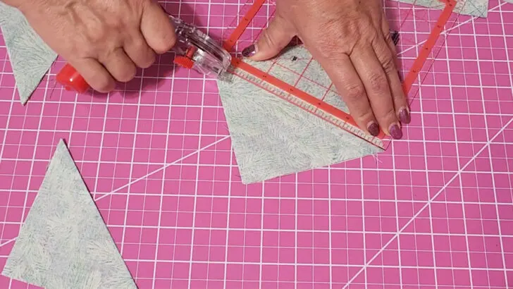 cut along the center diagonal line to separate the two new squares