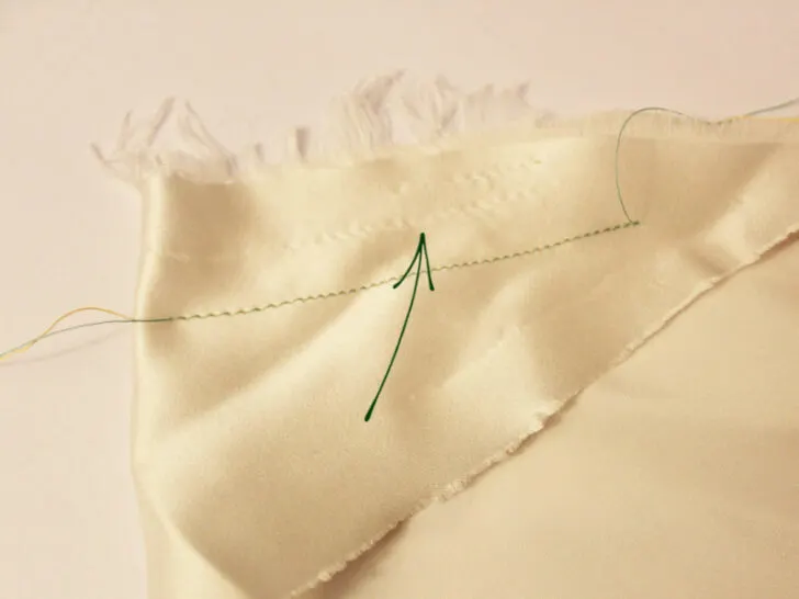 needles leave small holes in silk fabric