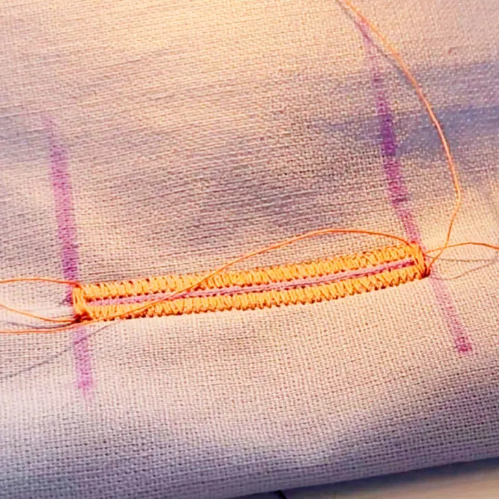  securing stitches should cover both sides of the buttonhole