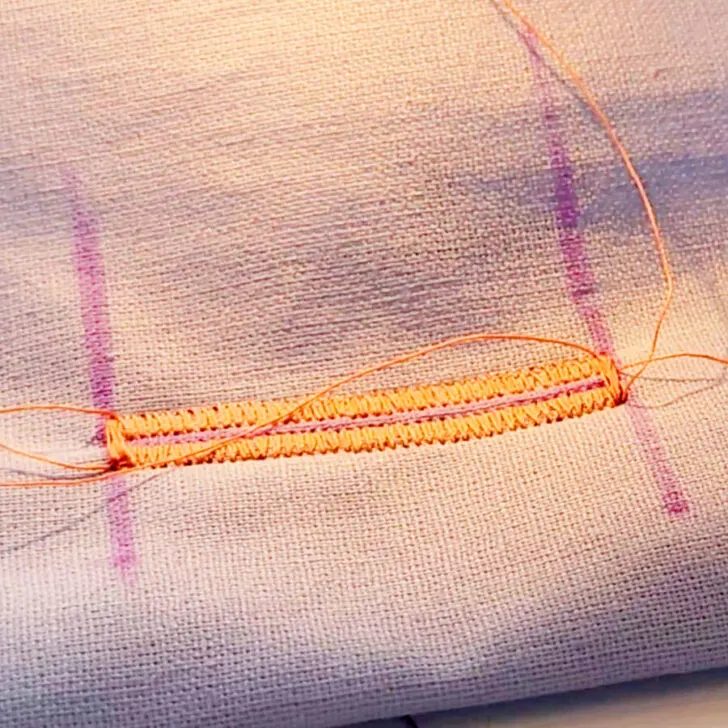 securing stitches should cover both sides of the buttonhole