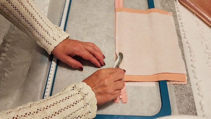cut seam allowances of the batting piece close to the stitches to avoid bulk