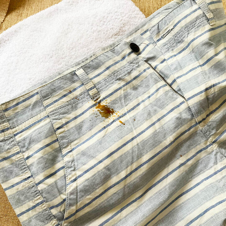 fresh coffee stain on shorts