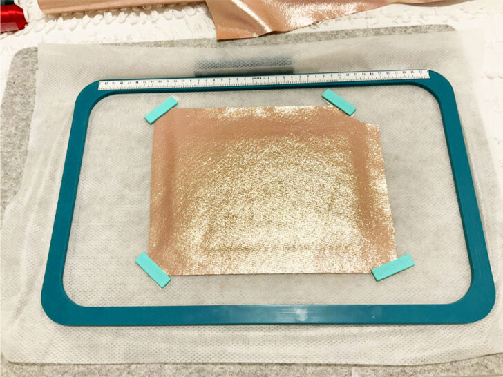 lay a piece of your base fabric right side up,