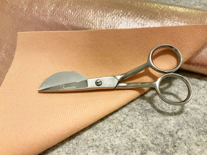 thin vinyl fabric and duckbill scissors