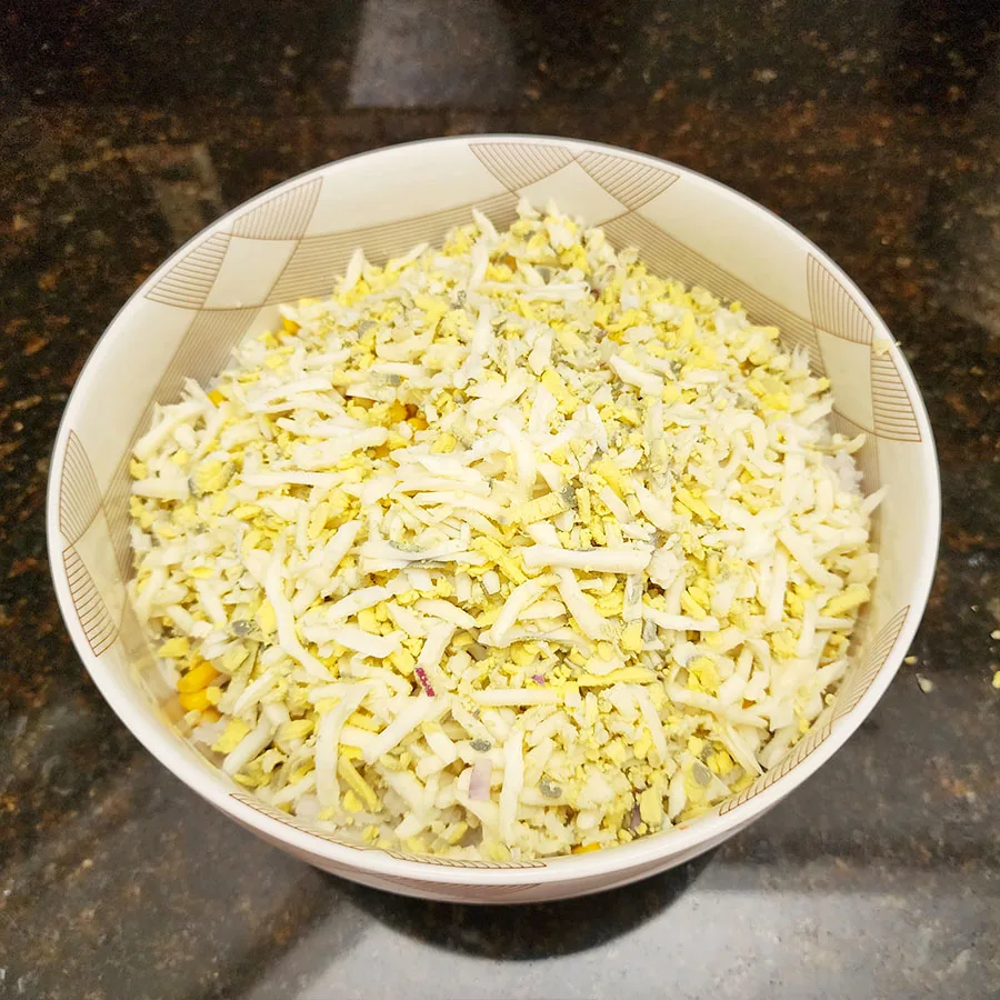 grated egg on a bowl