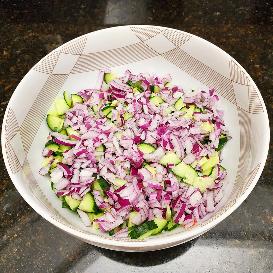 chopped red onion on a bowl