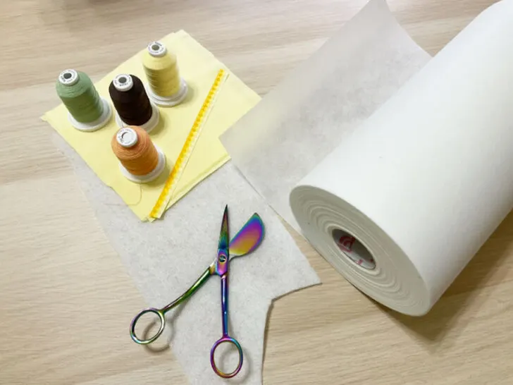 stabilizer, thread and duckbill scissors