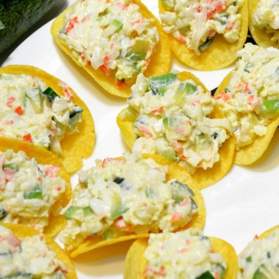 serving crab salad on chips