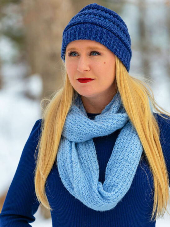 woman wearing a sweater and a scarf