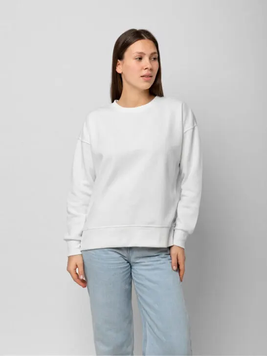 woman wearing sweatshirt and jeans