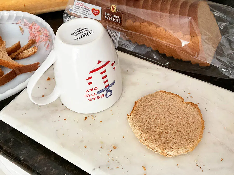 circular bread slice and mug