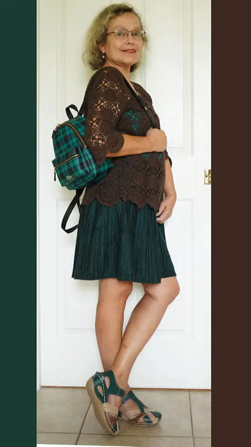 dark green dress paired with brown and green sandals