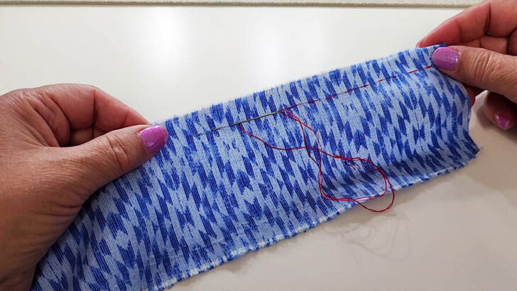 Sew small stitches along the marked line