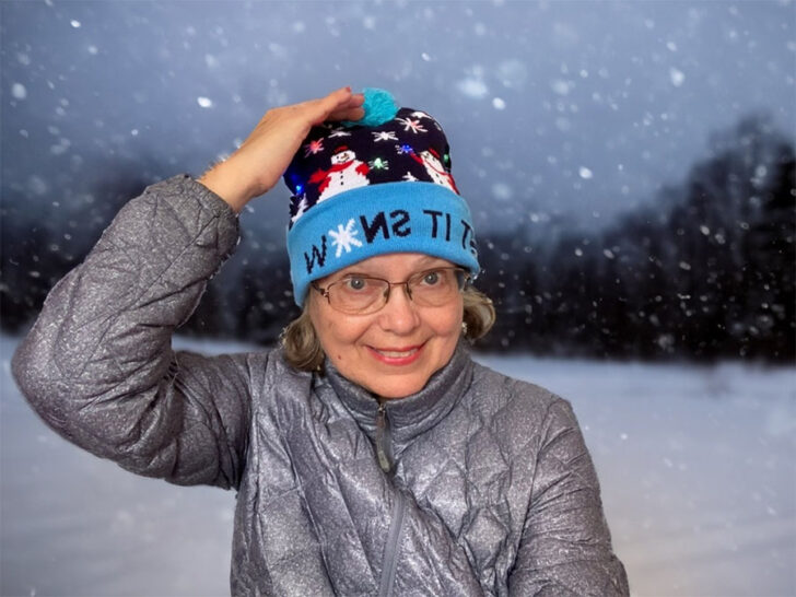 me wearing a Christmas themed LED light beanie