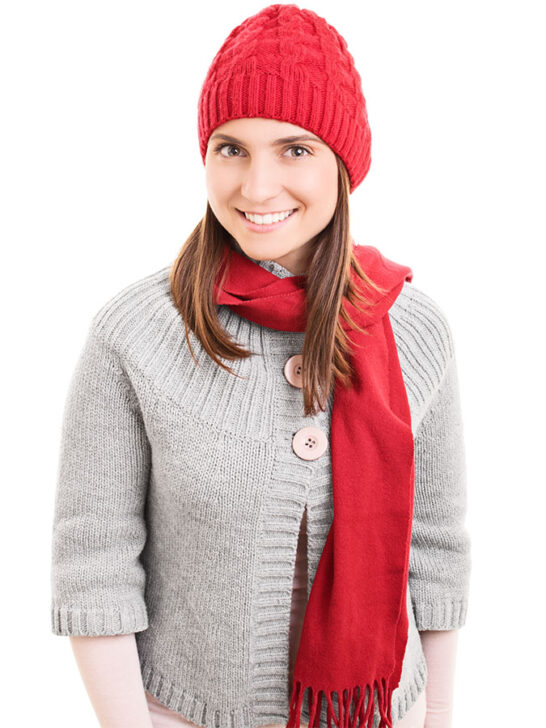 woman wearing a red knitted beanie