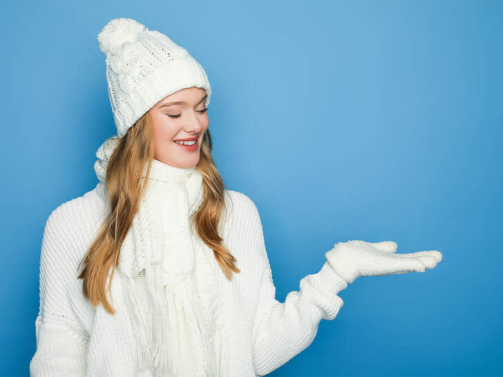 woman wearing a white cuffed beanie