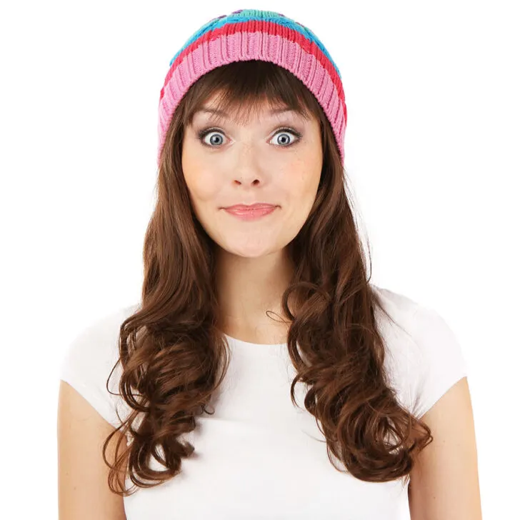 woman with bangs wearing a beanie
