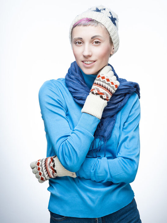 woman with short hair wearing a beanie