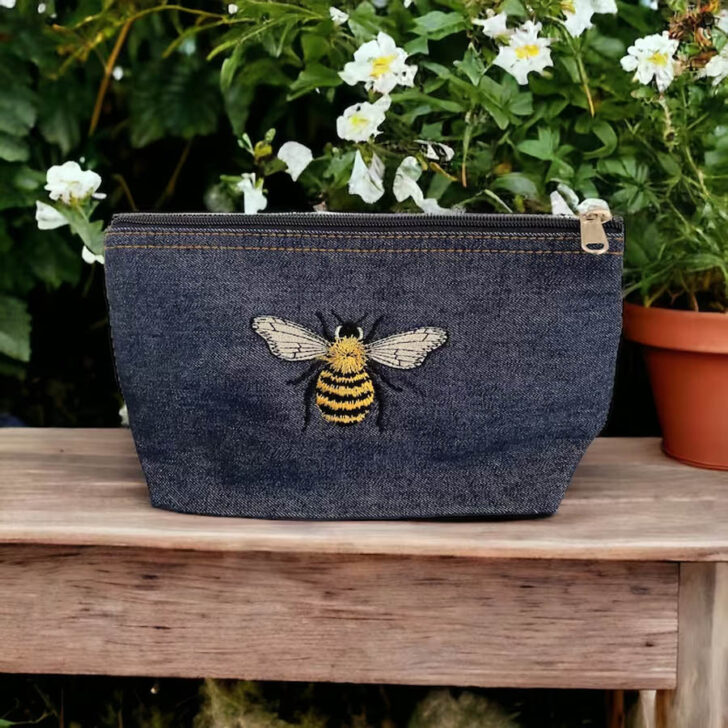 Chic Denim Cosmetic Bag with Embroidered Bee Design