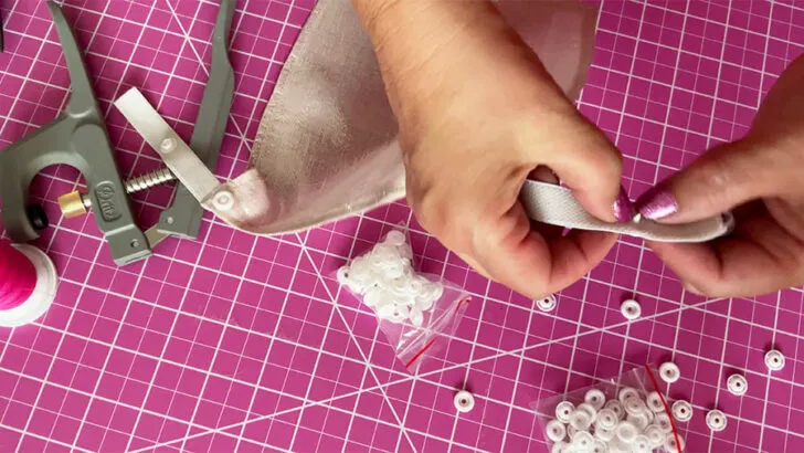 use an awl to make a small hole in the fabric