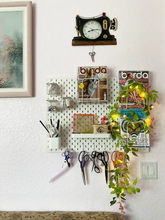 clock in the shape of a sewing machine in the room