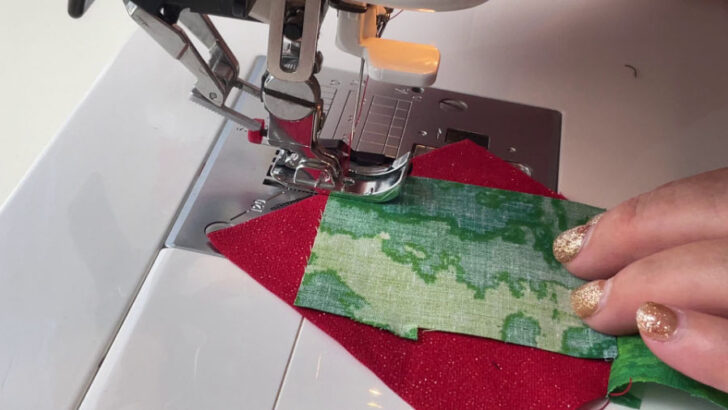 stitching green piece to red square