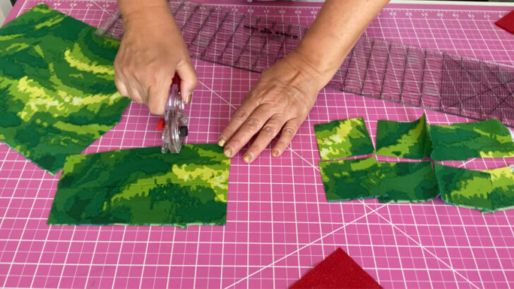 I am cutting fabric shapes with a rotary cutter