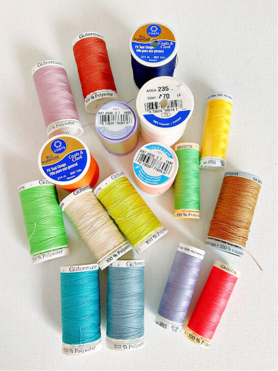 spools of all purpose polyester thread in my sewing room
