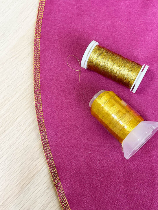 adding a gold metallic hem to a red skirt