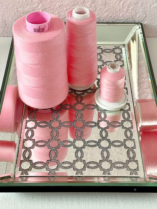 This image highlights the variety of pink thread options available for sewing enthusiasts